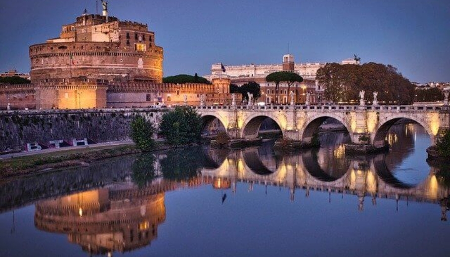 A view of Castel Sant'Angelo in Rome, with Ponte Milvio nearby, creating a picturesque setting for a marriage proposal.