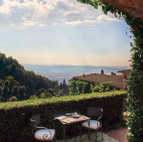 Table and 2 chairs with breathtaking view at Villa San Michele 