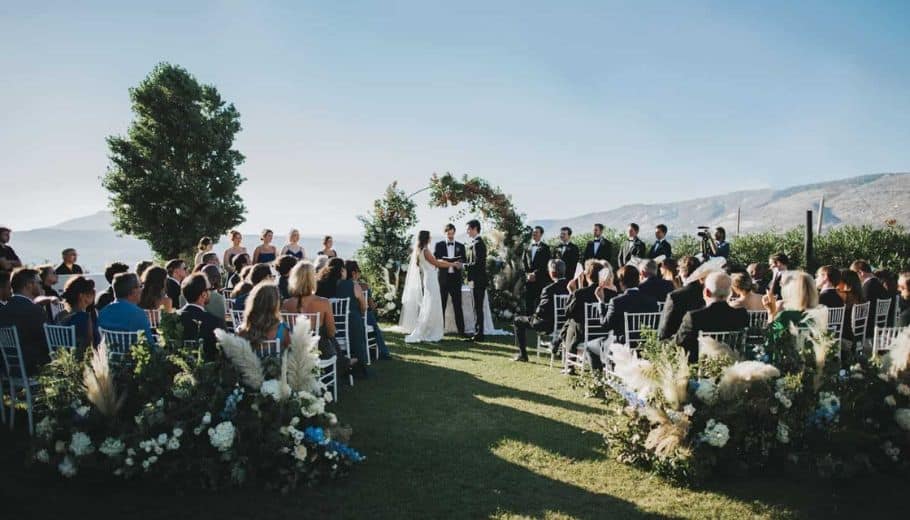 Ariana and Jack's wedding ceremony in the mountains, showcasing beautiful Italian traditions in a breathtaking setting.