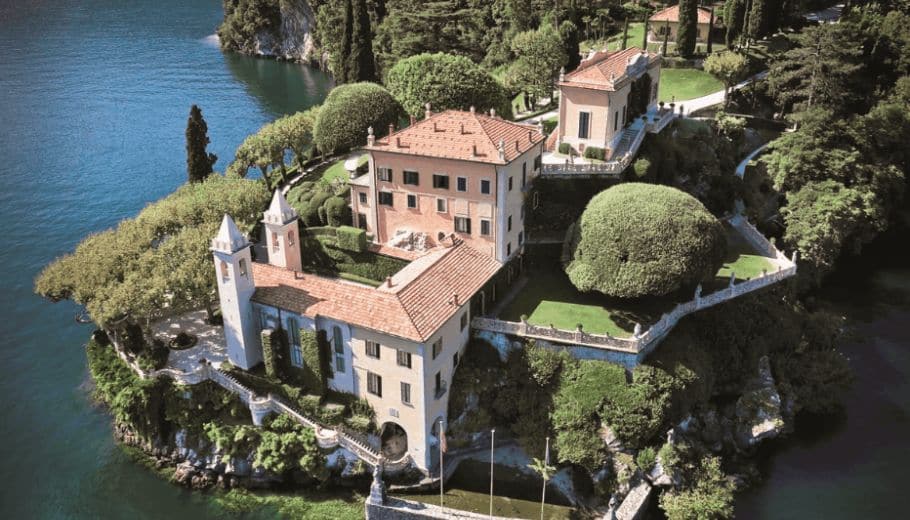 Aerial view of the Villa del Balbianello with overlooking the serene waters of Lake Como, perfect for wedding venue